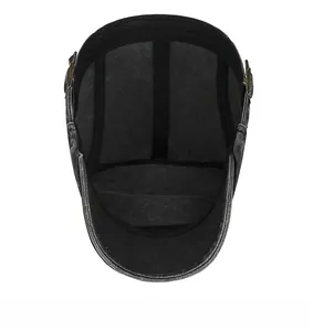 Detailed view of washed denim flat cap interior with sweatband and reinforced stitching