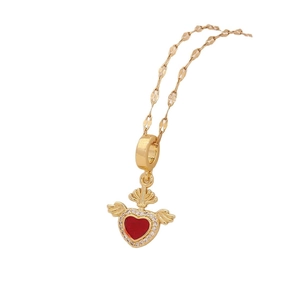 Golden heart necklace with red inlay, diamond-set edges, wings and crown on white background