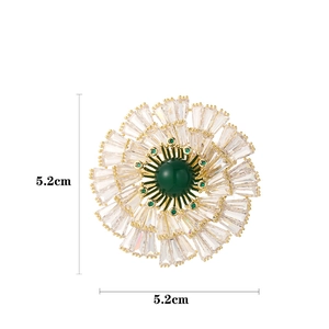 Elegant 5.2cm vintage floral brooch with dark green gemstone and crystal petals