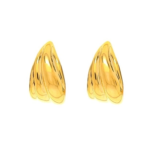 Golden teardrop earrings with textured wave pattern in a minimalist modern style