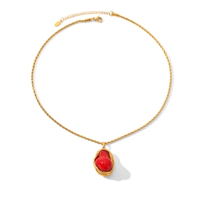 French vintage baroque style gold twist chain necklace with a red irregular stone pendant