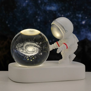 3D laser engraved astronaut crystal ball night light with glowing galaxy and resin base
