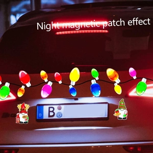 Night view of colorful bulb magnets and Christmas gnomes on car rear for holiday decor