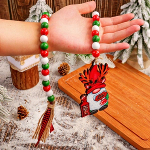 Festive Christmas wooden beaded ornament with red green white beads and gnome pendant