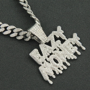 Iced out Cash Money letter pendant necklace with thick Cuban link chain in silver finish