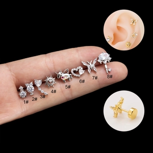 Set of surgical steel cartilage earrings with zircon butterfly, heart, and moon shapes