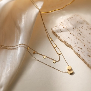 Elegant 18K gold-plated layered necklace with star charms and crescent moon pendant