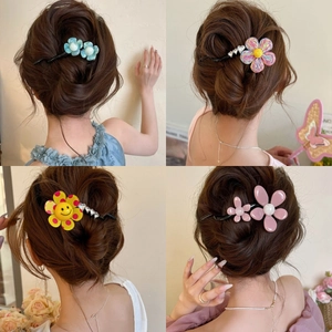 Minimalist floral hair clips for women shown in four elegant styles with pearl accents