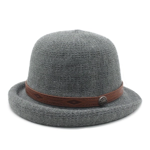 Elegant grey bowler hat with a vintage brown decorative band and engraved metal buckle
