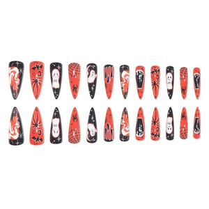 Halloween Stiletto press-on nails featuring spiders, ghosts and bats in orange and black