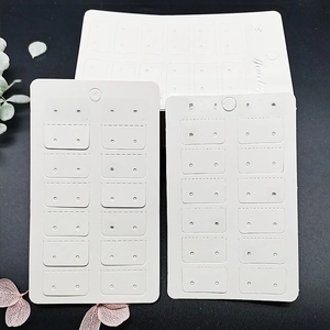 White fashion jewelry display cards with 12 pair holes for earring storage and packaging