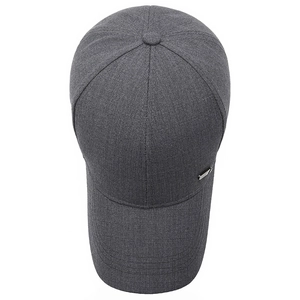 Classic dark grey men's business baseball cap with minimalist metal logo and textured fabric