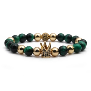 Luxury green tiger eye stone bead bracelet featuring a gold crown and micro-pave crystals