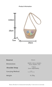 Detail of straw woven crossbody bag with knit flowers showing dimensions 24x16x7cm