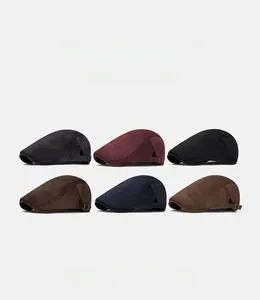 Detail of adjustable metal buckles on vintage newsboy caps in multiple classic colors