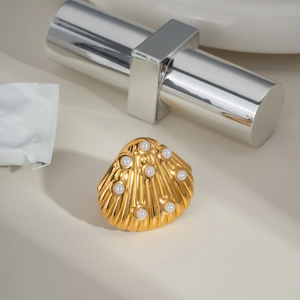 Golden sea shell and pearl jewelry set with elegant earrings and ring for women