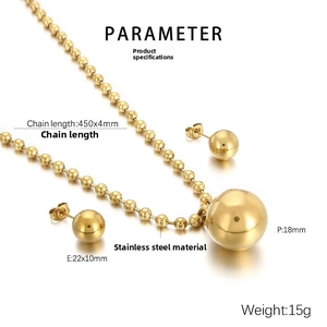 Detailed view of golden stainless steel ball pendant and matching earrings set