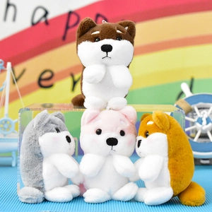 Ομάδα χαριτωμένων βελούδινων μπρελόκ Shiba Inu σε διάφορα ζωηρά χρώματα και σχέδια
