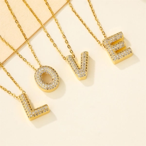 Gold plated initial necklaces with LOVE letter pendants and cubic zirconia stones