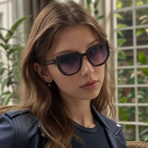 Chic cat-eye sunglasses with hollow temples and purple gradient lenses for women