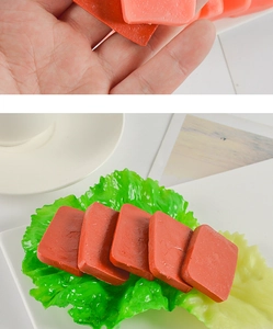 Close-up of realistic PVC luncheon meat model with detailed muscle fiber texture
