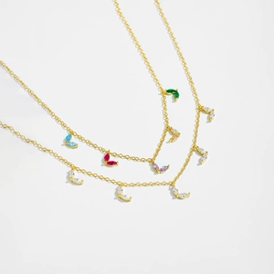 S925 sterling silver gold necklace with colorful leaf-shaped zircon pendants on white background