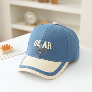 Close-up of contrast color cotton baseball cap for kids with BEAR embroidery and bear graphic