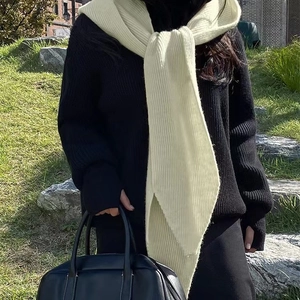 Chic beige knitted hooded scarf shawl for women styled with casual winter outfit