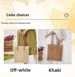 Detail of straw woven tote bags in cream and khaki colors with brown leather handles