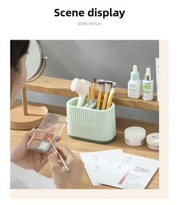 Macro detail of a green multi-compartment makeup brush holder for desk organization