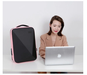 Detail of hard shell business laptop backpack with TSA lock and pink contrast side panel