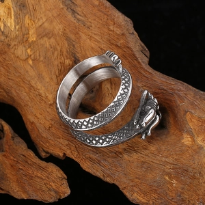 Vintage silver-colored dragon wrap ring with detailed scales in textured matte steel