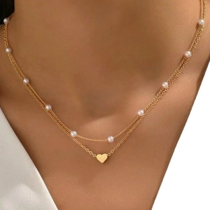 Elegant gold double-layer necklace with white pearls and a heart pendant for women