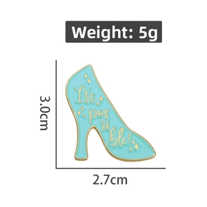Mint green high heel enamel brooch with It's possible text and star accents, 5g weight