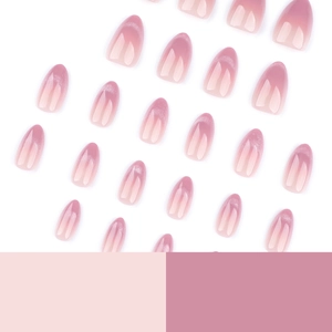 Sparkling pink purple ombre almond press-on nails with fine glitter tips on white background