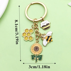 Bee and sunflower keychain with honey pot and pearl charm, length 8.1cm and width 3cm