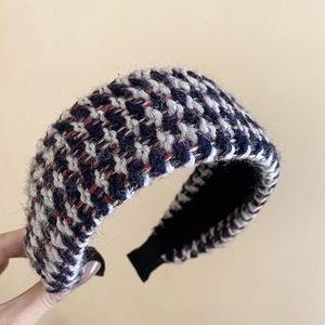 Close-up of navy and purple tweed headband showing rich knit texture and non-slip lining