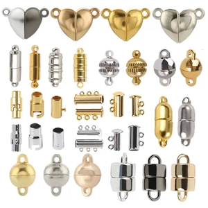 Assorted magnetic jewelry clasps in heart and cylinder shapes for DIY necklace making