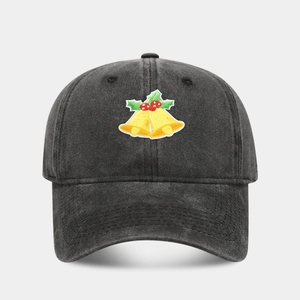 Close-up of golden Christmas bells embroidery on vintage dark grey washed cotton baseball cap