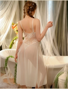 Detailed back view of a long white lace nightgown with floral embroidery and chiffon hem