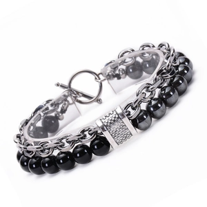 Detail of double-layer men's bracelet with black natural stone beads and silver steel chain