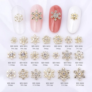 Winter Christmas snowflake nail art charms in gold and silver alloy designs