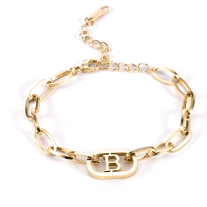 Detail of golden stainless steel chain bracelet featuring a matte finish letter B charm