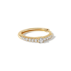 Macro detail of gold plated S925 sterling silver hoop earring with sparkling clear zircons