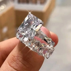 Luxury emerald cut silver ring set with micro-paved side stones for women