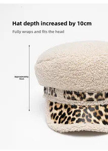 Detail of lamb wool military cap featuring 10cm deep crown and leopard print brim