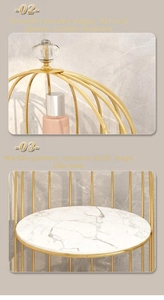 Detail of golden iron tiered rack with marble pattern ceramic shelves and rounded edges