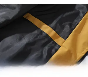 Detailed view of internal pocket on contrast color jacket with black silk lining