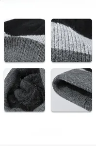Detail view of the chunky knit pattern and thick black fleece lining for winter warmth