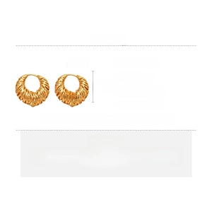 Detail of woven texture gold earrings with silver needles and copper base dimensions